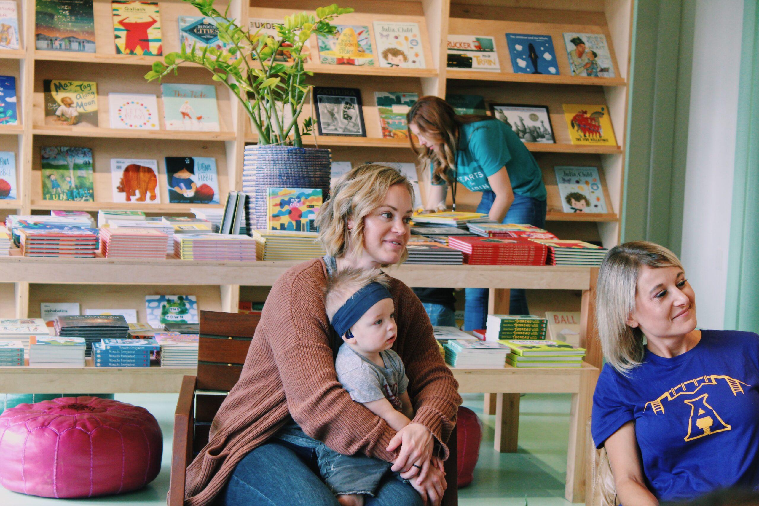 Ike and his mom sitting in a chair