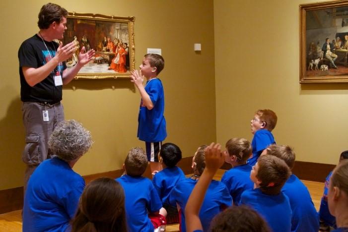 group of kids at camp learning
