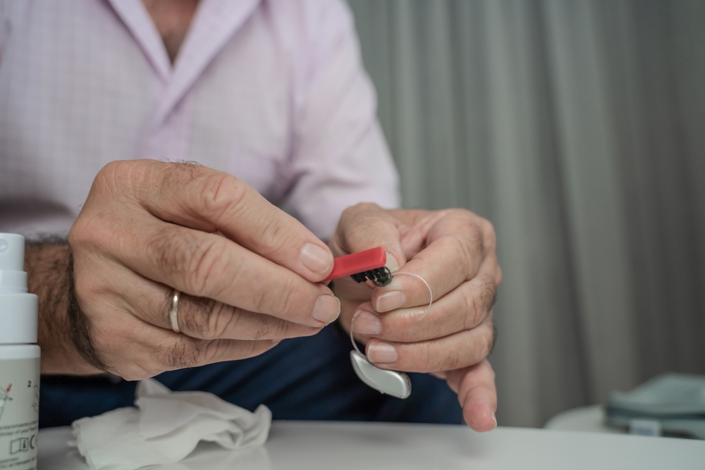 Cleaning hearing aids.